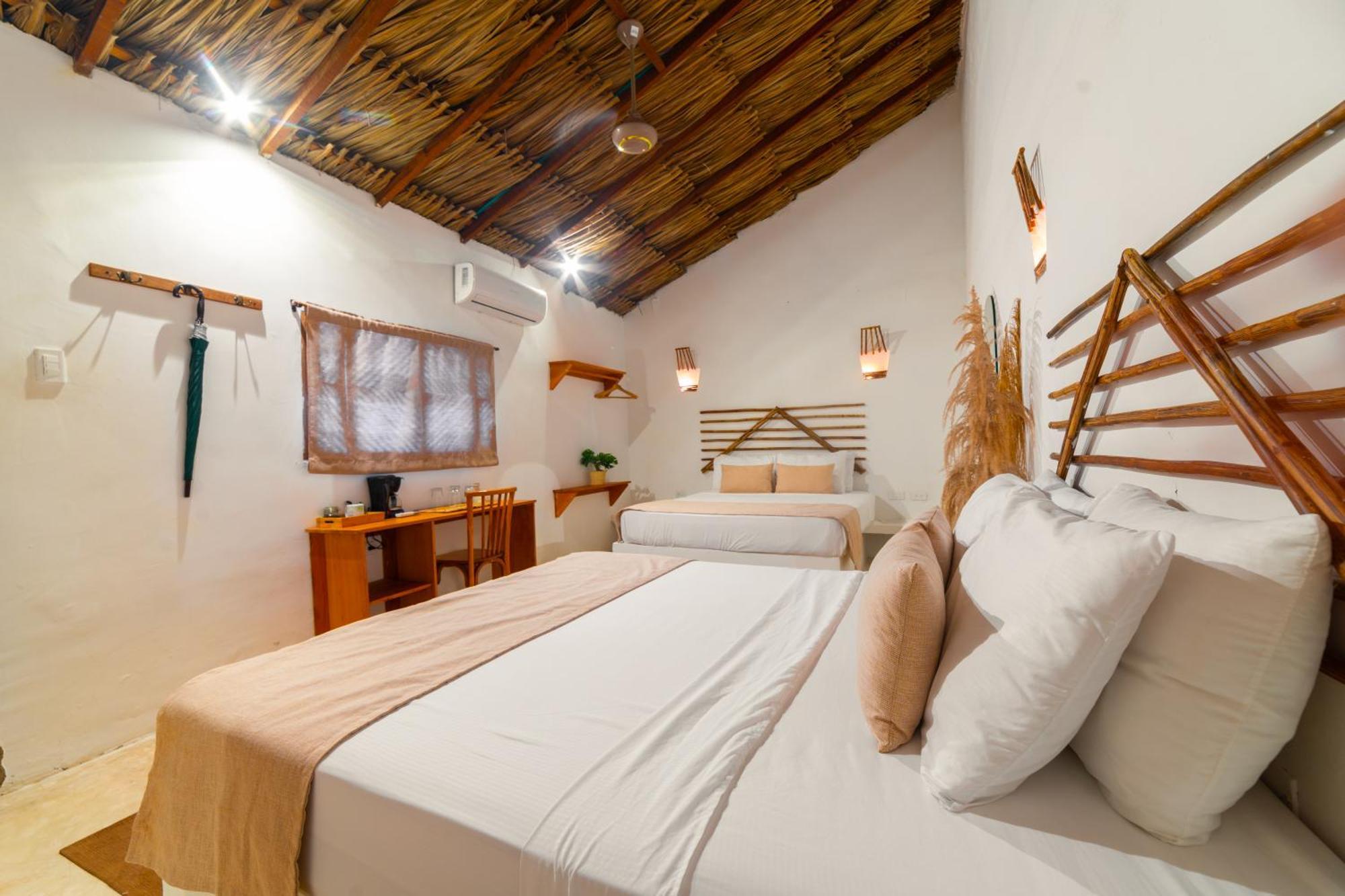 Vista Mare Beach House Cano de Loro Номер фото